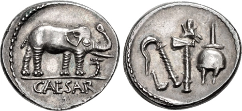 Rome: The Caesarians. Julius Caesar. April-August 49 BCE. AR Denarius (18mm, 3.88 g, 7h). Military mint traveling with Caesar. Obverse: Elephant advancing right, trampling on horned serpent (?); CAESAR in exergue. Reverse: Simpulum, aspergillum, securis, and apex.