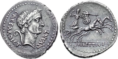 Rome: Republic. The Caesarians. Julius Caesar. January 44 BCE. AR Denarius (19mm, 3.99 g, 12h). Rome mint. M. Mettius, moneyer. Obverse: Wreathed head right, lituus and CAESAR • DICT behind at left, QVART at right. Reverse: Juno Sospita wearing goat skin headdress, in a galloping biga (two-horse chariot) right, brandishing a spear in her right hand and holding a shield in her left, M METTIVS in exergue.